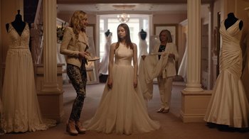 Movie still from “The End of the F***ing World” (2017), directed by Jonathan Entwistle – Two women and a woman in a wedding dress; Wide shot, Over the shoulder angle