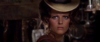 Movie still from “Once Upon a Time in the West” (1968), directed by Sergio Leone – A person wearing a hat; Close Up shot, Low angle