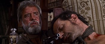 Movie still from “Once Upon a Time in the West” (1968), directed by Sergio Leone – Close Up shot, Low angle