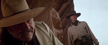 Movie still from “Once Upon a Time in the West” (1968), directed by Sergio Leone – Medium shot, Low angle