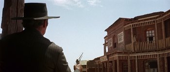 Movie still from “Once Upon a Time in the West” (1968), directed by Sergio Leone – Wide shot, Low angle