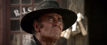 Movie still from “Once Upon a Time in the West” (1968), directed by Sergio Leone – Close Up shot, Low angle
