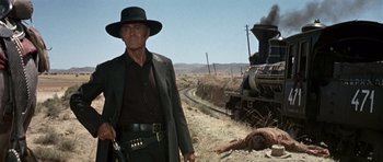 Movie still from “Once Upon a Time in the West” (1968), directed by Sergio Leone – Wide shot, Low angle