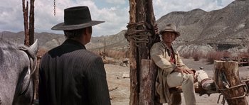 Movie still from “Once Upon a Time in the West” (1968), directed by Sergio Leone – Wide shot, Over the shoulder angle