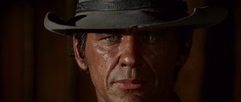 Movie still from “Once Upon a Time in the West” (1968), directed by Sergio Leone – Close Up shot, Low angle