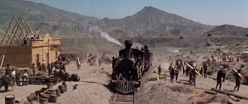 Movie still from “Once Upon a Time in the West” (1968), directed by Sergio Leone – Extreme Wide shot, High angle