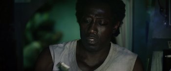 Movie still from “The Expendables 3” (2014), directed by Patrick Hughes – A person with his eyes closed; Close Up shot, Low angle