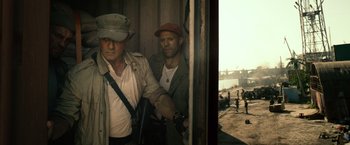 Movie still from “The Expendables 3” (2014), directed by Patrick Hughes – Two men are looking out of a train window; Medium shot, Low angle