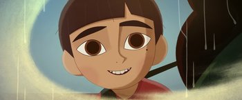 Movie still from “My Father's Dragon” (2022), directed by Nora Twomey – An animated picture of a young boy smiling; Extreme Close Up shot, High angle