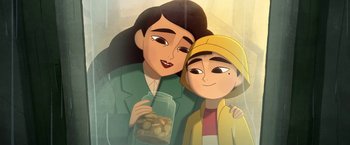 Movie still from “My Father's Dragon” (2022), directed by Nora Twomey – A cartoon of a woman and a boy holding a jar of nuts; Medium shot, High angle
