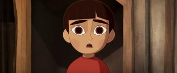 Movie still from “My Father's Dragon” (2022), directed by Nora Twomey – An animated picture of a boy with a surprised look on his face; Close Up shot, High angle