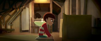 Movie still from “My Father's Dragon” (2022), directed by Nora Twomey – A boy sitting on the floor in front of a television; Wide shot, High angle