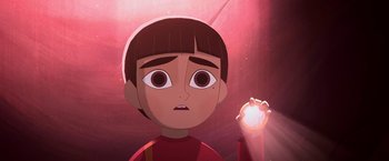 Movie still from “My Father's Dragon” (2022), directed by Nora Twomey – A cartoon of a boy holding something in his hand; Close Up shot, Low angle