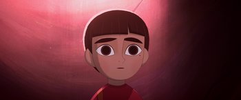 Movie still from “My Father's Dragon” (2022), directed by Nora Twomey – A cartoon of a young boy with brown eyes; Close Up shot, High angle