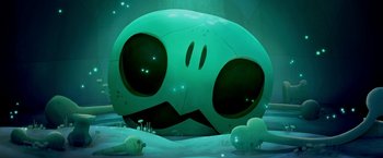 Movie still from “My Father's Dragon” (2022), directed by Nora Twomey – A green balloon sitting on top of a beach; Extreme Wide shot, Low angle