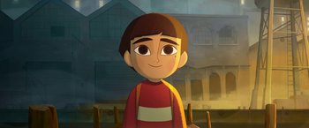 Movie still from “My Father's Dragon” (2022), directed by Nora Twomey – An animated picture of a boy with a red shirt; Medium shot, Low angle
