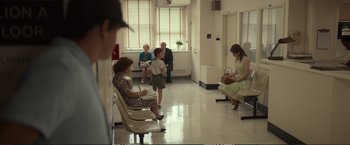 Movie still from “The Glass Castle” (2017), directed by Destin Daniel Cretton – A group of people sitting in a waiting room; Wide shot, Over the shoulder angle