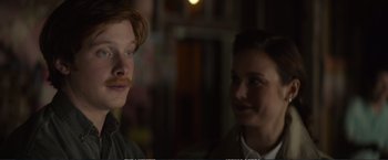 Movie still from “The Glass Castle” (2017), directed by Destin Daniel Cretton – A man and a woman standing next to each other in the dark; Close Up shot, Over the shoulder angle