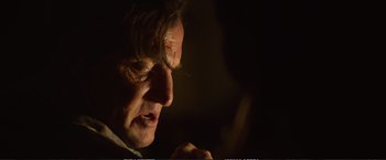 Movie still from “The Glass Castle” (2017), directed by Destin Daniel Cretton – A person looking down at his face; Close Up shot, Over the shoulder angle