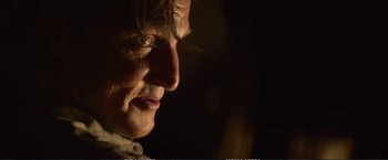 Movie still from “The Glass Castle” (2017), directed by Destin Daniel Cretton – A person's face in the dark; Extreme Close Up shot, Over the shoulder angle