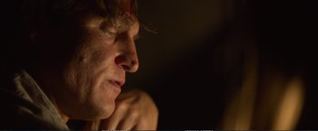 Movie still from “The Glass Castle” (2017), directed by Destin Daniel Cretton – A man's face in the dark; Close Up shot, Over the shoulder angle