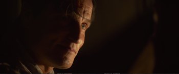 Movie still from “The Glass Castle” (2017), directed by Destin Daniel Cretton – A man's face in the dark; Close Up shot, Low angle