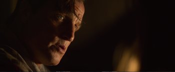 Movie still from “The Glass Castle” (2017), directed by Destin Daniel Cretton – A man's face in the dark; Close Up shot, Low angle