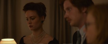 Movie still from “The Glass Castle” (2017), directed by Destin Daniel Cretton – A man and a woman wearing necklaces and pearls; Close Up shot, Over the shoulder angle