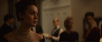 Movie still from “The Glass Castle” (2017), directed by Destin Daniel Cretton – A person wearing a dress; Close Up shot, Over the shoulder angle