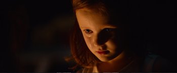 Movie still from “The Glass Castle” (2017), directed by Destin Daniel Cretton – A little girl with a tear on her face; Close Up shot, High angle