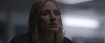 Movie still from “The Good Nurse” (2022), directed by Tobias Lindholm – A person with long blonde hair; Close Up shot, Low angle