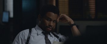 Movie still from “The Good Nurse” (2022), directed by Tobias Lindholm – A man in a white shirt and a black tie; Close Up shot, Over the shoulder angle