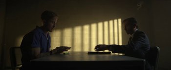 Movie still from “The Gray Man” (2022), directed by Joe Russo – Medium shot, Over the shoulder angle