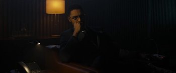 Movie still from “The Gray Man” (2022), directed by Joe Russo – Medium shot, Low angle