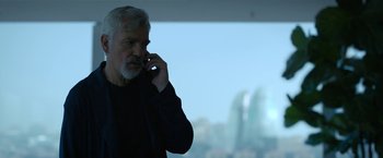 Movie still from “The Gray Man” (2022), directed by Joe Russo – Medium shot, Low angle