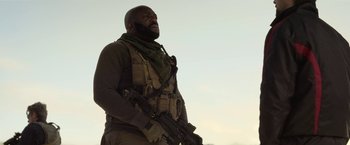 Movie still from “The Gray Man” (2022), directed by Joe Russo – Medium shot, Low angle