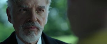 Movie still from “The Gray Man” (2022), directed by Joe Russo – Close Up shot, Over the shoulder angle