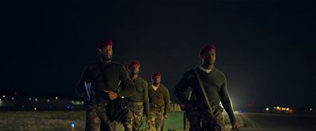 Movie still from “The Gray Man” (2022), directed by Joe Russo – Medium shot, Low angle