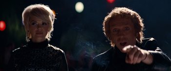 Movie still from “Once Upon a Time in Hollywood” (2019), directed by Quentin Tarantino – A man and a woman are smoking in the dark; Close Up shot, Low angle