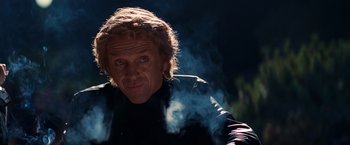 Movie still from “Once Upon a Time in Hollywood” (2019), directed by Quentin Tarantino – A person wearing a black jacket; Close Up shot, Low angle