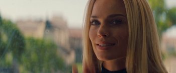 Movie still from “Once Upon a Time in Hollywood” (2019), directed by Quentin Tarantino – A woman's face looking out of a window; Close Up shot, Over the shoulder angle