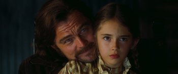 Movie still from “Once Upon a Time in Hollywood” (2019), directed by Quentin Tarantino – A man and a little girl posing for a picture; Close Up shot, Over the shoulder angle