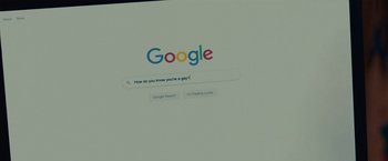 Movie still from “The Half of It” (2020), directed by Alice Wu – A computer screen showing a google search page; Extreme Close Up shot, Over the shoulder angle