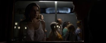 Movie still from “The Hand of God” (2021), directed by Paolo Sorrentino – A group of people standing in a room; Close Up shot, Low angle