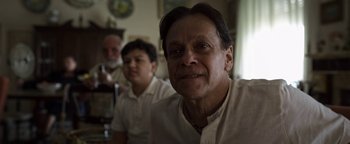 Movie still from “The Hand of God” (2021), directed by Paolo Sorrentino – A person wearing a white shirt; Close Up shot, Low angle