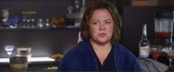 Movie still from “The Happytime Murders” (2018), directed by Brian Henson – A person wearing a blue towel; Close Up shot, Over the shoulder angle