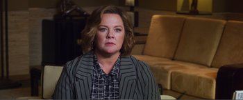 Movie still from “The Happytime Murders” (2018), directed by Brian Henson – A person sitting in a chair; Close Up shot, Over the shoulder angle