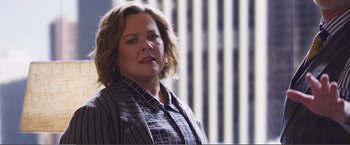 Movie still from “The Happytime Murders” (2018), directed by Brian Henson – A person with short hair; Close Up shot, Over the shoulder angle