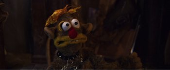 Movie still from “The Happytime Murders” (2018), directed by Brian Henson – A stuffed animal wearing a collar; Close Up shot, High angle