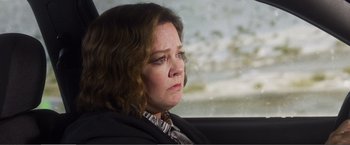 Movie still from “The Happytime Murders” (2018), directed by Brian Henson – A person sitting in a car; Close Up shot, Over the shoulder angle